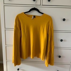 TopShop top. Mustard color, size small. Cute open slit back.